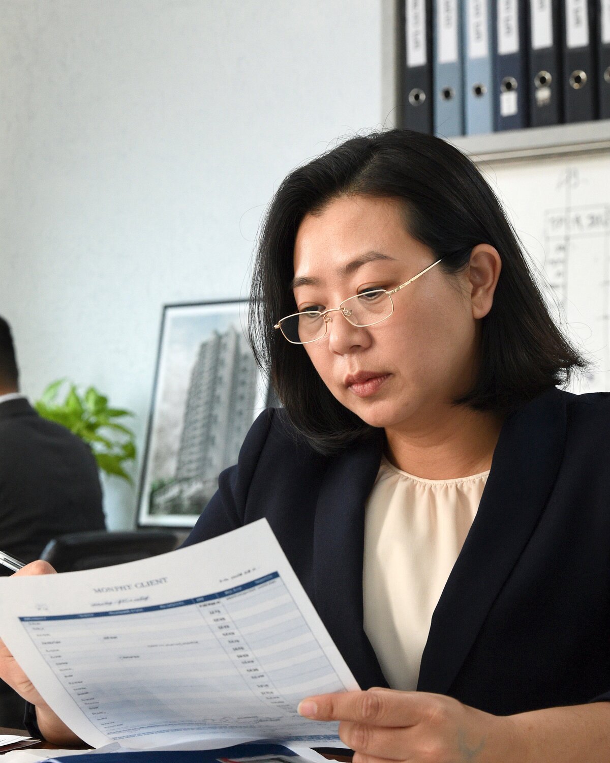 Managing director reviewing a client report
